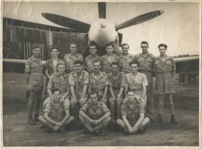 Alf Foster, sitting on the floor on the right