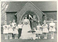 Jaqueline England being crowned by Mrs Roper